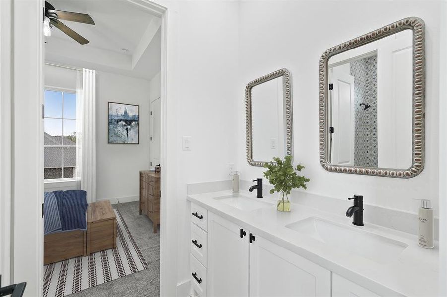 Virtually staged. Step into the Hollywood bath, a stylish and versatile space designed with both aesthetics and functionality in mind. Featuring the same high-quality plumbing and electrical fixtures found throughout the home, this bathroom combines convenience and elegance.