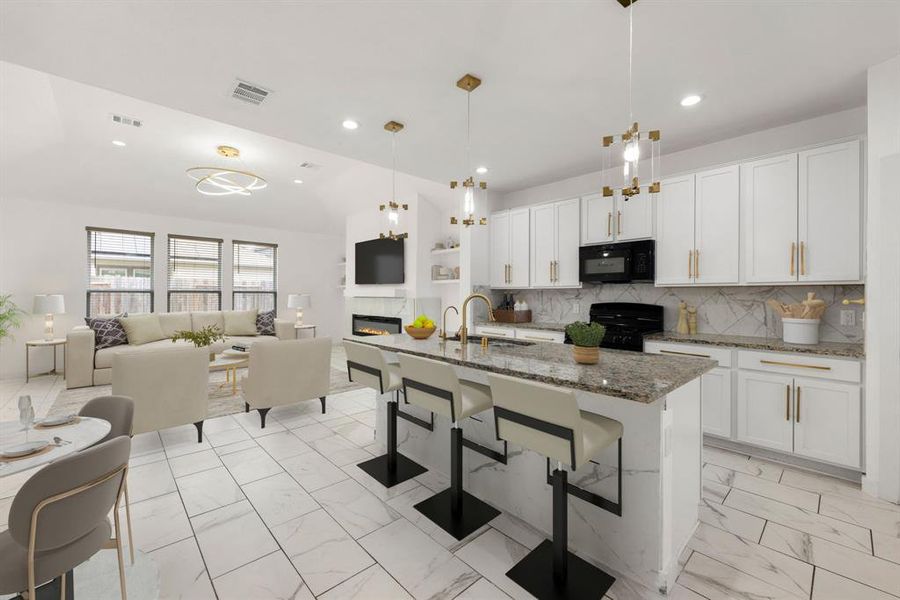 This modern kitchen exudes elegance with its sleek granite countertops, gleaming brass fixtures, and pendant lighting. The spacious island offers ample prep space, while the open-concept design flows seamlessly into the dining and living areas, perfect for entertaining. With chic white cabinetry and polished tile flooring, this kitchen is both stylish and functional, making it the heart of the home.