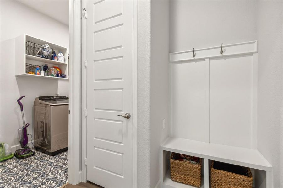 Mudroom featuring washer / clothes dryer