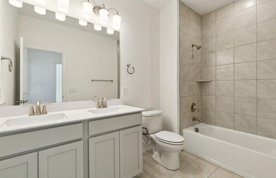 Upgraded secondary bathroom*real home pictured