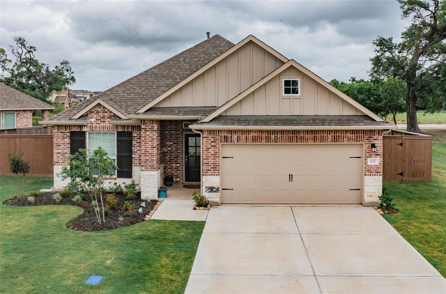 you can see this lovely upgrade of stone and brick, this home is an all brick home great landscaping oversized lot and yard