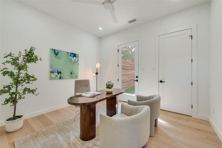 Office featuring light wood-type flooring and ceiling fan