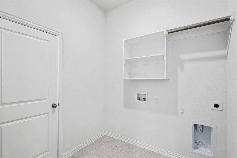 Laundry area featuring light tile patterned flooring, electric dryer hookup, washer hookup, and hookup for a gas dryer