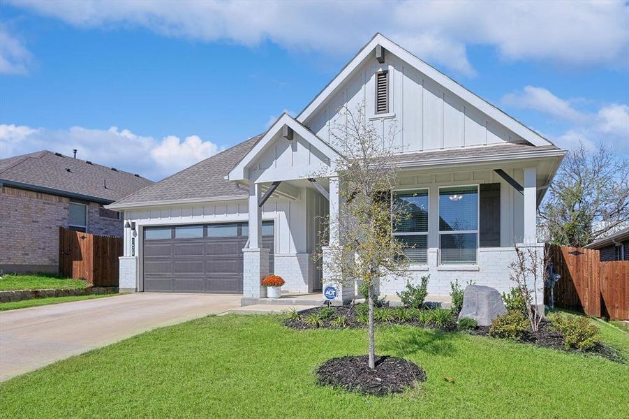 Beautiful painted white brick home with phenomenal curb appeal