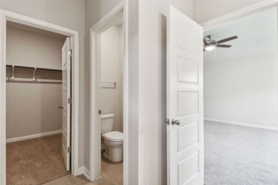 Primary suite bathroom in the Hughes floorplan at a Meritage Homes community.