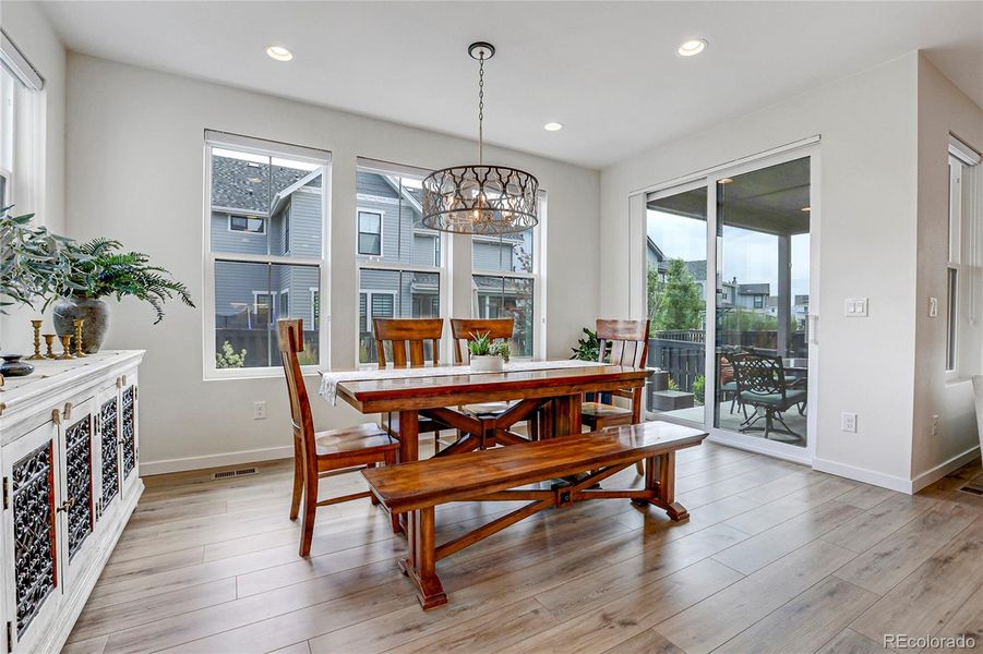 Spacious dining room with back yard access