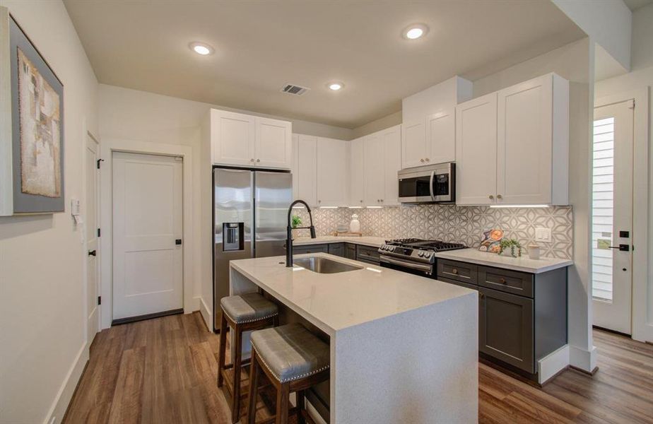 View from garage entrance to kitchen making easier loading grocery or uploading luggage for weekend getaway.