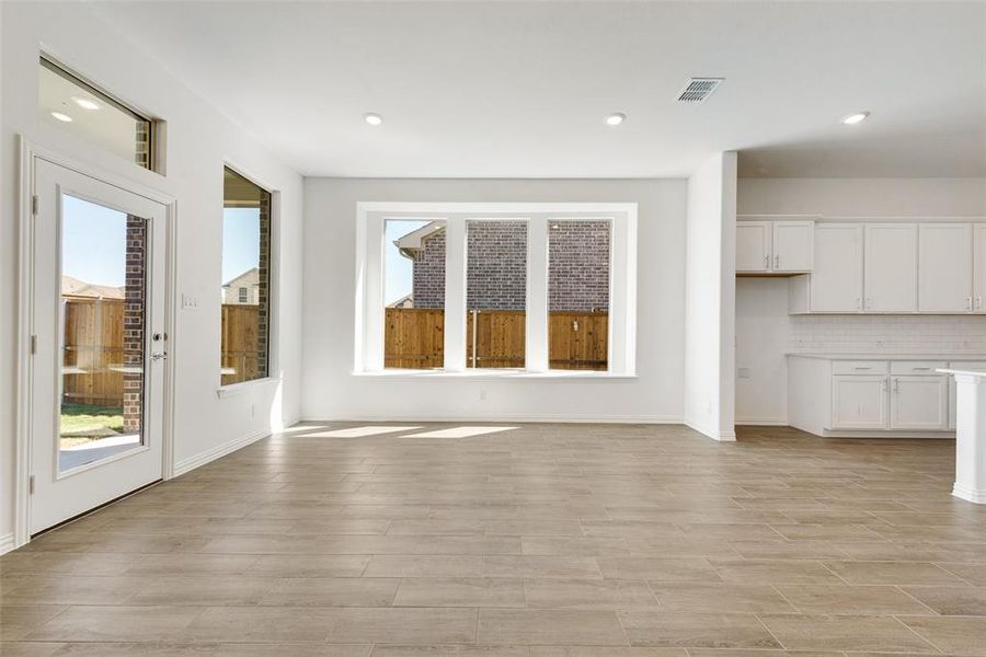 Unfurnished living room with light hardwood / wood-style flooring