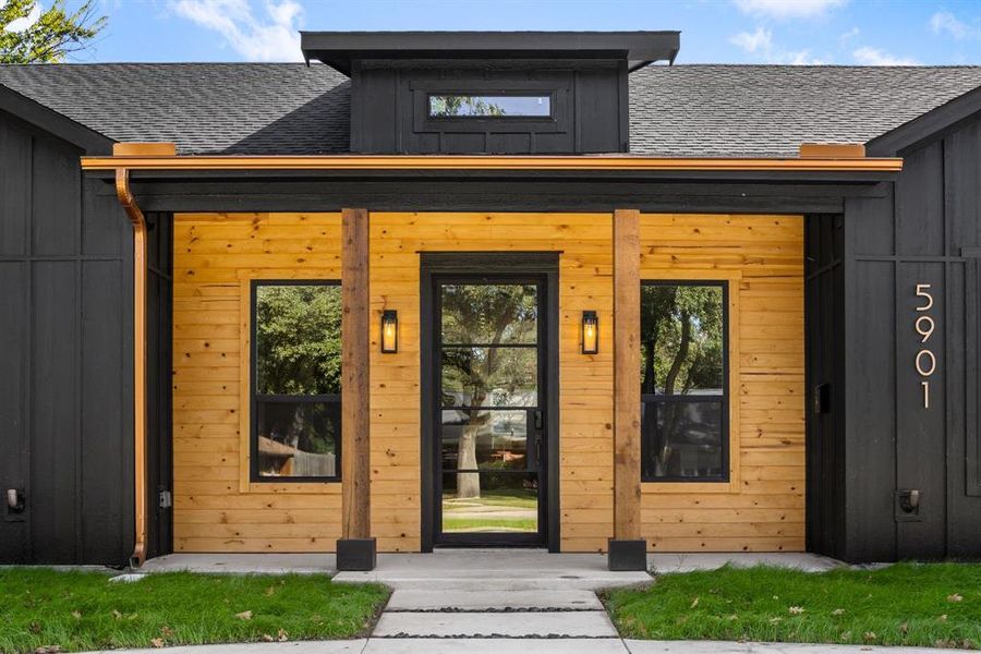 Entrance to property with a porch