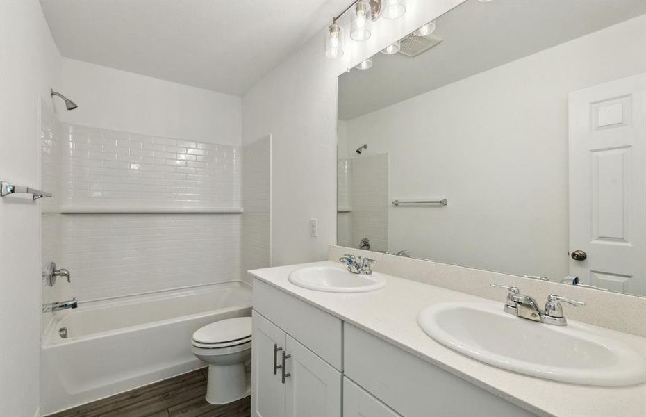 Upgraded secondary bathroom *real home pictured