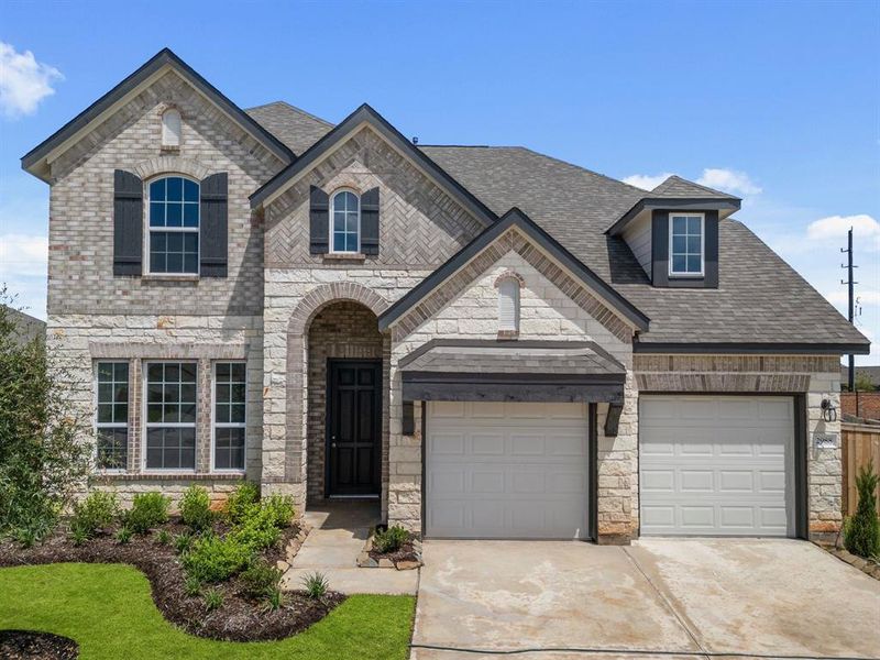 Welcome home to 2988 Golden Dust Drive located in the master planned community of Sunterra and zoned to Katy ISD.