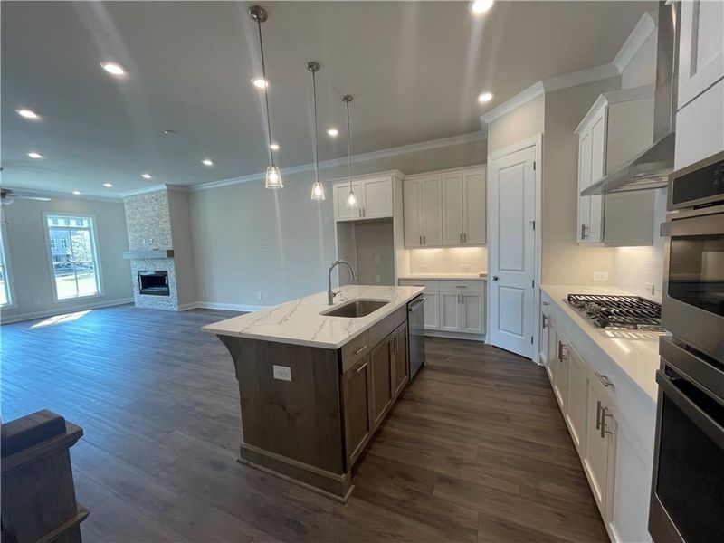 Stunning Cambria counter tops and GE appliance that feature micro-oven combination and a 36" cooktop!