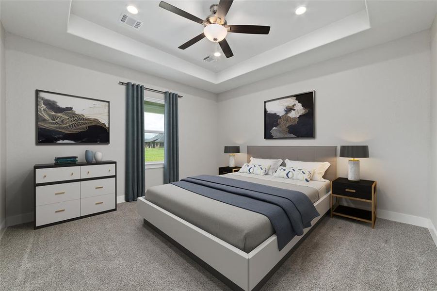 Virtually Staged. Step into the primary bedroom, where plush carpeting welcomes you and a large window invites abundant natural sunlight. An overhead ceiling fan ensures year-round comfort, completing the serene and inviting atmosphere.