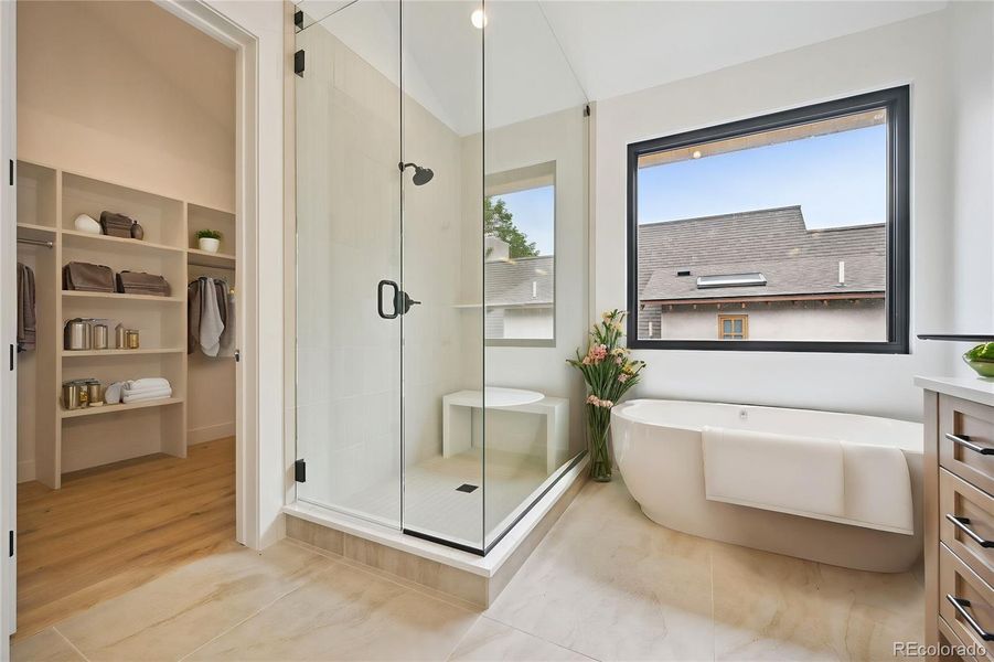 Primary Bath and Closet with Matching High Ceilings - Virtually Staged