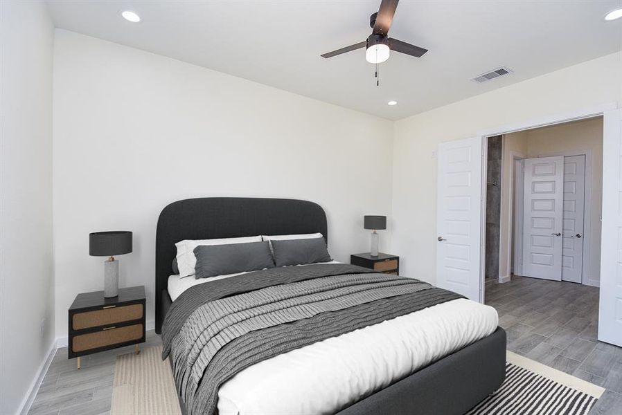 Large and lovely master bedroom with double doors that take you to your master bathroom.