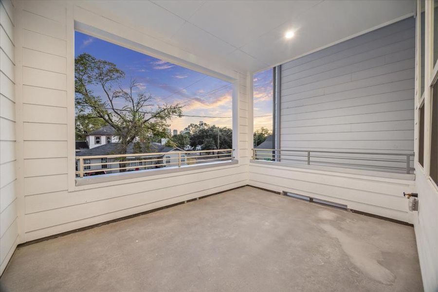 Enjoy peaceful evenings or morning coffee on this inviting second-floor balcony. Offering space for outdoor seating, the balcony is perfect for taking in the sunset or unwinding after a long day. With easy access from the interior, this private outdoor retreat enhances the living experience by blending comfort and fresh air.