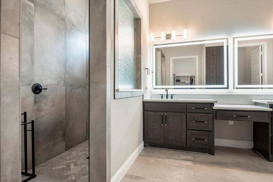 Bathroom with vanity and walk in shower