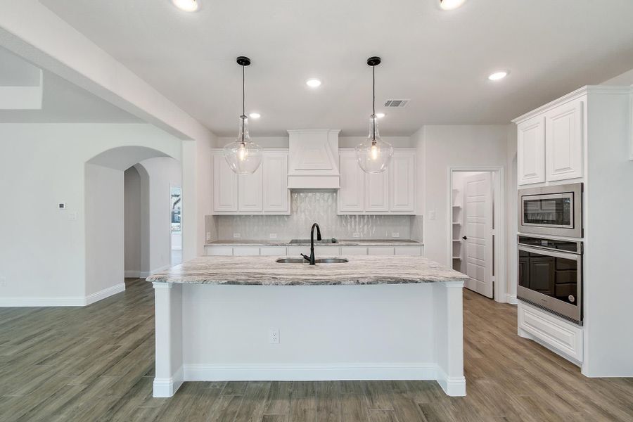 Kitchen | Concept 2972 at Lovers Landing in Forney, TX by Landsea Homes