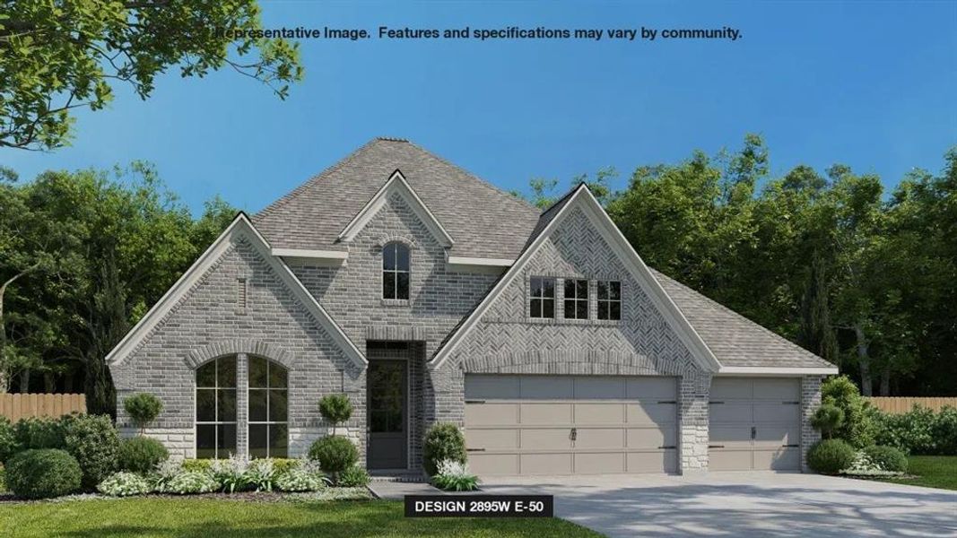 View of front of home featuring a garage