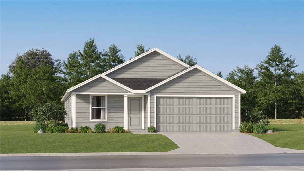 View of front of house featuring a front yard and a garage