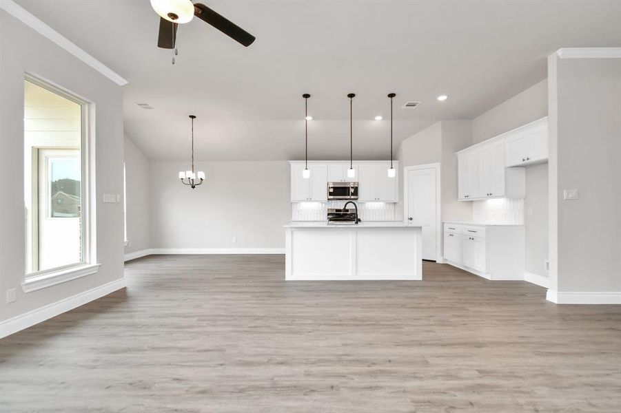 Open concept kitchen with kitchen island