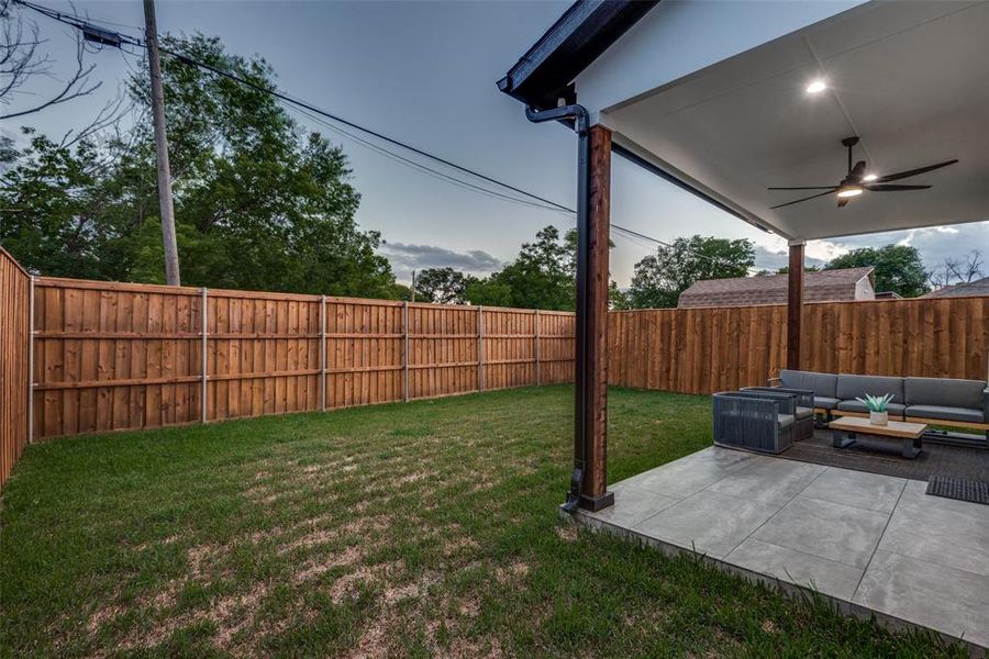 View of yard featuring wood privacy fence.