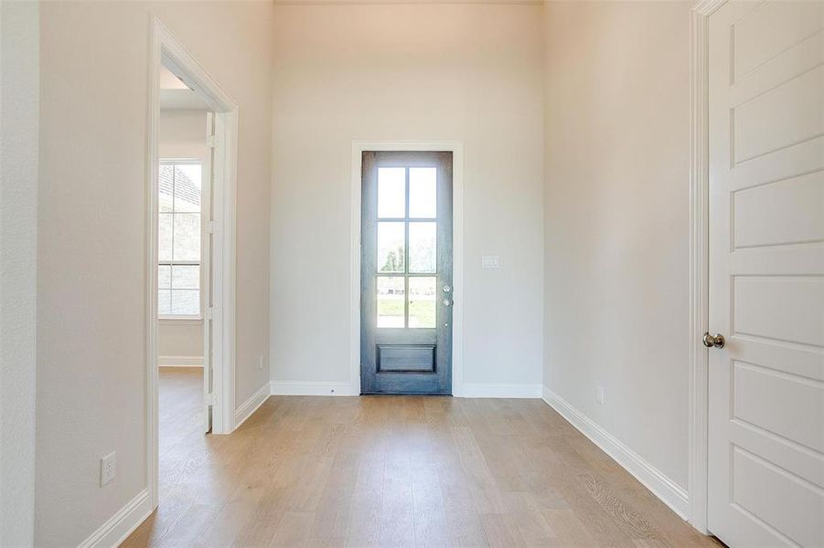 Foyer featuring light hardwood / wood-style flooring