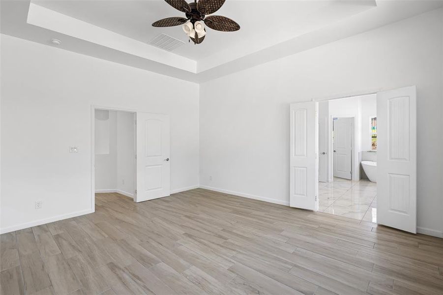 Wood/Tile Floors, Tray Ceiling & Separate From Other Bedrooms For Maximum Privacy