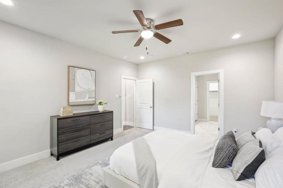 Primary Bedroom featuring the en suite bath