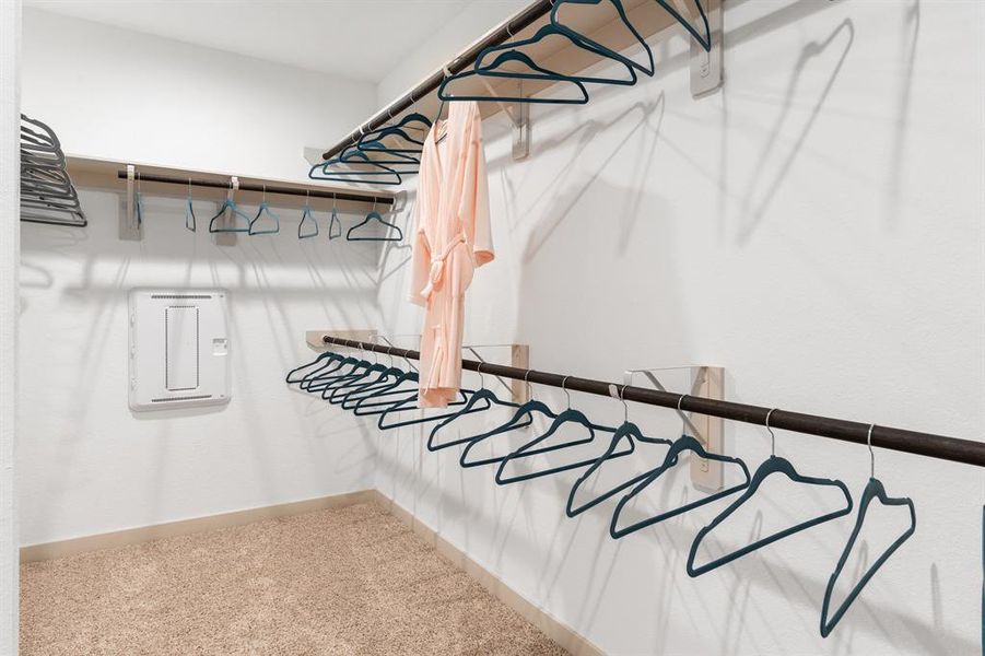 Huge Owners Suite Walk In Closet and this is only half of the closet!  **Image representative of plan only and may vary as built** Home is still Under Construction and NEW Photos coming soon!