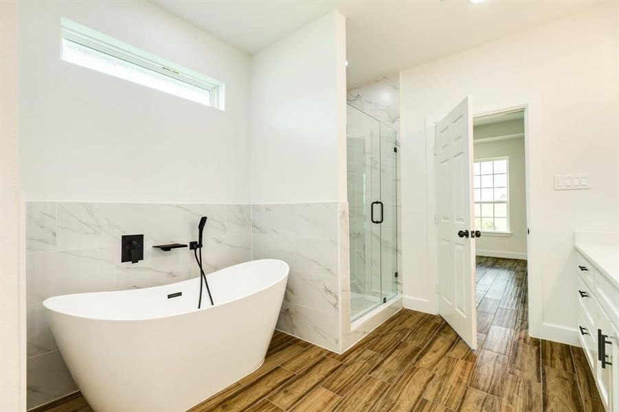 Soaking tub with walk-in shower
