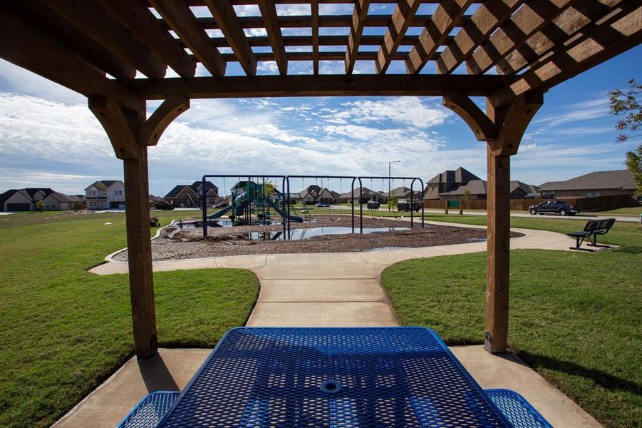 View of patio / terrace with a pergola and a playground