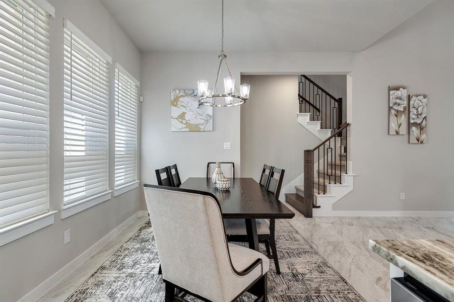 Dining room featuring an inviting chandelier