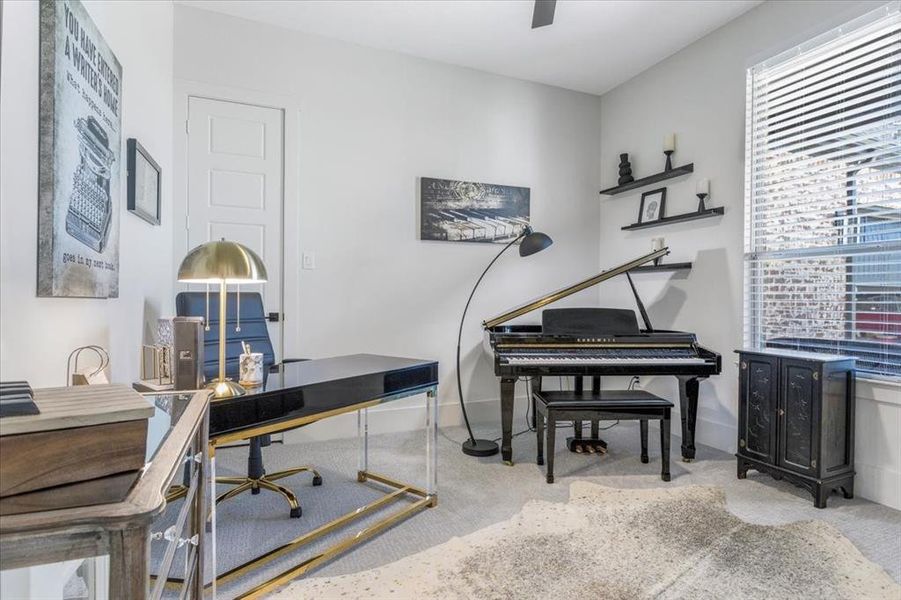 Office area featuring light colored carpet