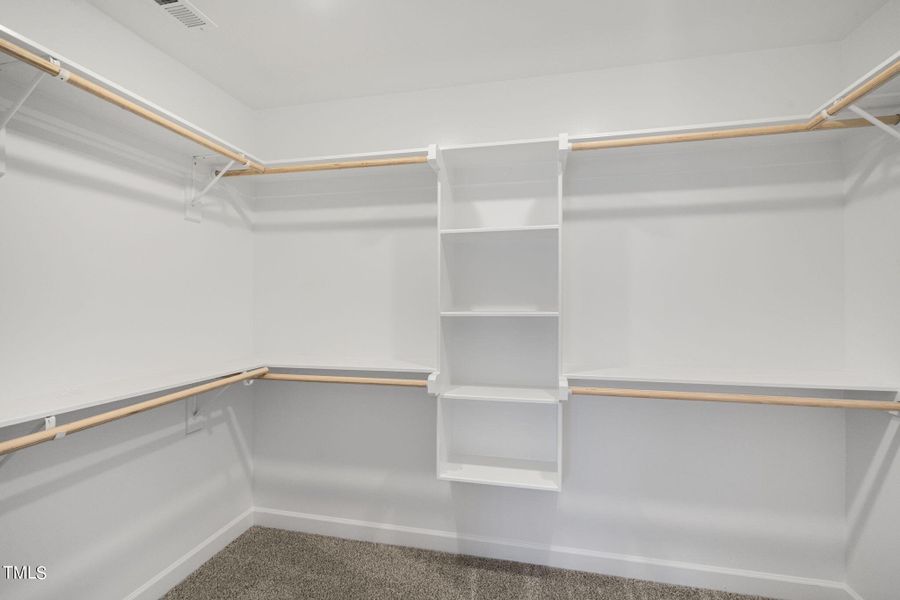 Woodshelving in Owners' Closets!