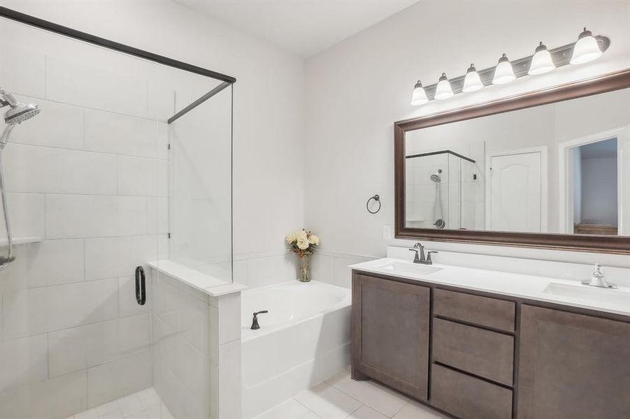 Master bath with walk in shower, garden tub & dual vanities