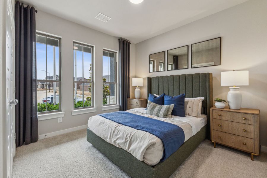 Bedroom in the Stanley II home plan by Trophy Signature Homes