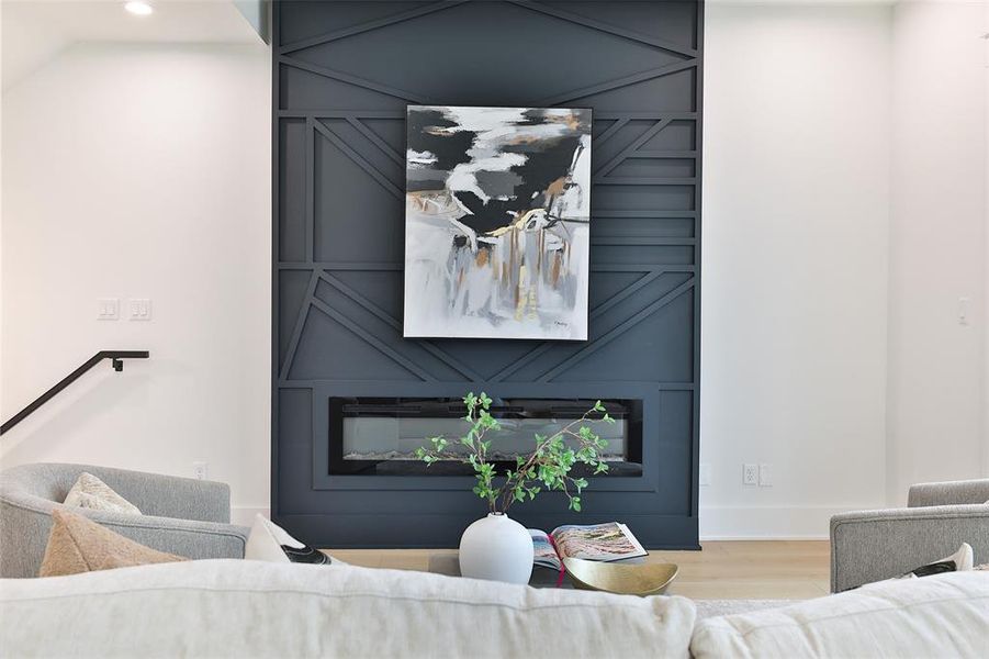Add shelving or furniture pieces flanking your new electric low maintenance fireplace.