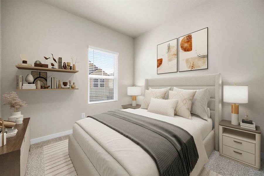 Secondary bedroom features plush carpet, neutral paint, large window and ample closet space.