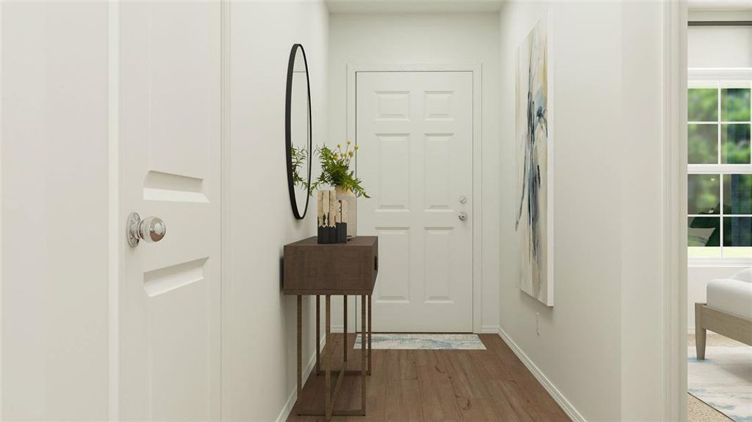 Doorway with hardwood / wood-style flooring