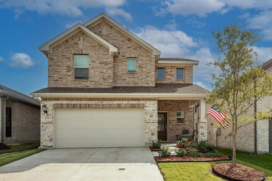 View of front of home with a garage