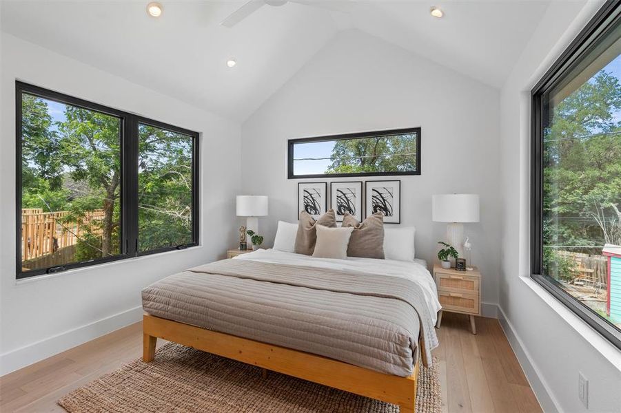 The primary bedroom has vaulted ceilings, a huge walk-in closet and a private full bath.