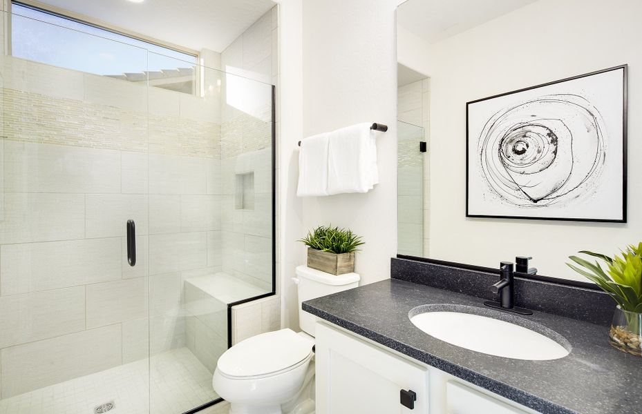 Secondary bathroom with glass walk-in shower