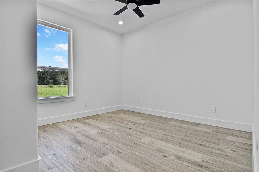 Second bedroom with ceiling fan