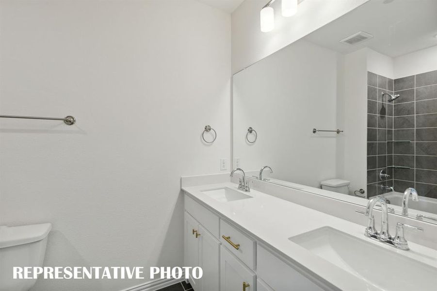 Guests will enjoy their own space in this beautifully finished guest bath.  REPRESENTATIVE PHOTO