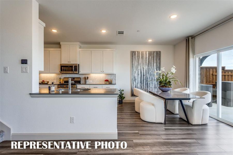 Modern, open concept designs can be found in all of our floor plans in Celina Hills! REPRESENTATIVE PHOTO OF MODEL HOME.