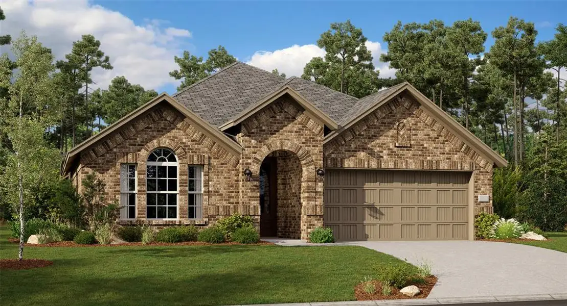 View of front of property with a front yard and a garage