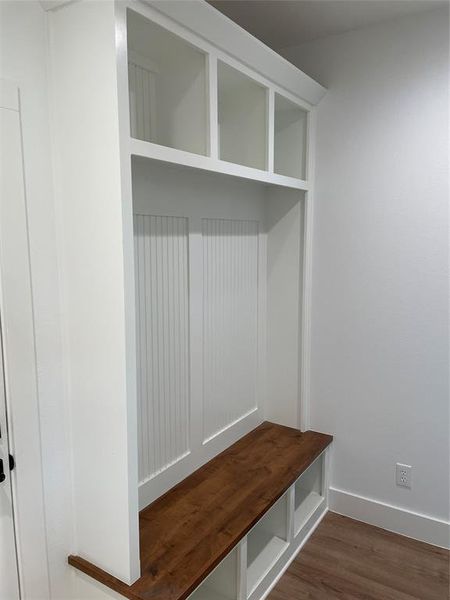 Mudroom featuring dark hardwood / wood-style floors