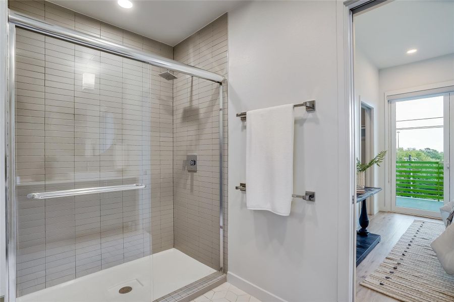 Modern tiled walk in shower.