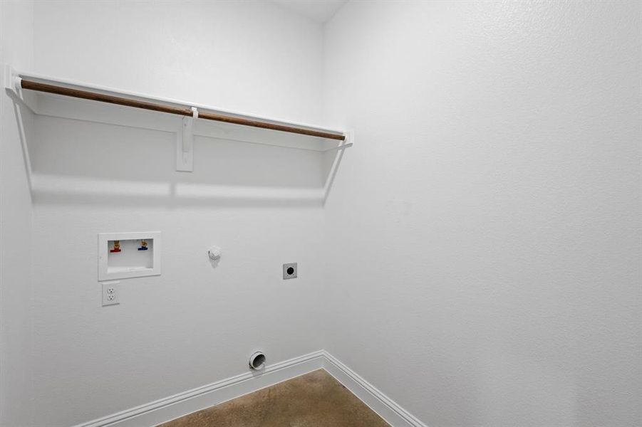 Laundry area with gas dryer hookup, hookup for an electric dryer, washer hookup, and carpet